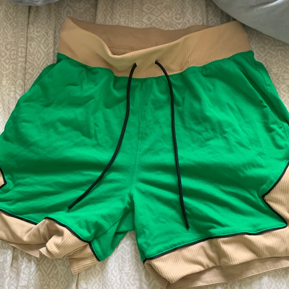 Green and beige Jordan basketball shorts